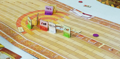 Heading for the finish in Chariots of Rome - the remains of three chariots litter the track...