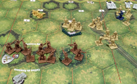 Backed by an armoured car, my infantry take the ridge in the middle and await the Japanese counter-attack