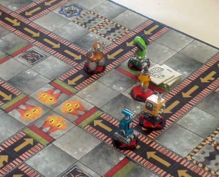 Brightly-coloured robots racing across the factory floor...