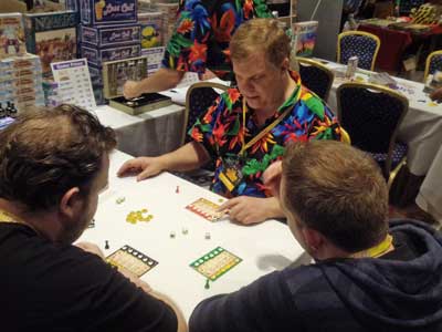 Kris Gould of Wattsalpoag explains Buccaneer Bones at the UK Games Expo